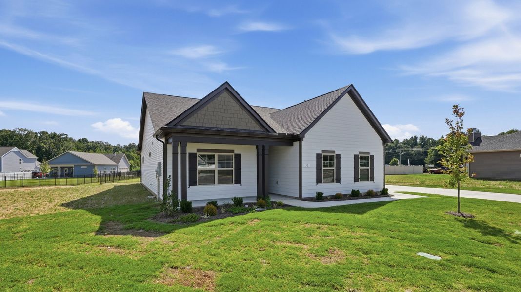 Front exterior of a new home in Stillwater, Tullahoma, TN, highlighting curb appeal (Image 16). Front exterior of a new home in Stillwater, Tullahoma, TN, highlighting curb appeal (Image 16).