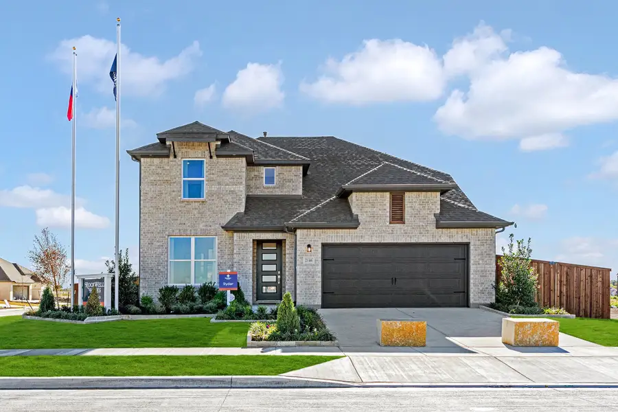 Representative exterior photo of a completed home built from the Freedom by Rockwell Homes in Creekside, Royse City, TX (Image 1). Representative exterior photo of a completed home built from the Freedom by Rockwell Homes in Creekside, Royse City, TX (Image 1).
