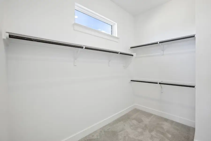Representative unfurnished interior of a home built from the Anderson by Taylor Morrison in Easton Park, Austin (Image 32).