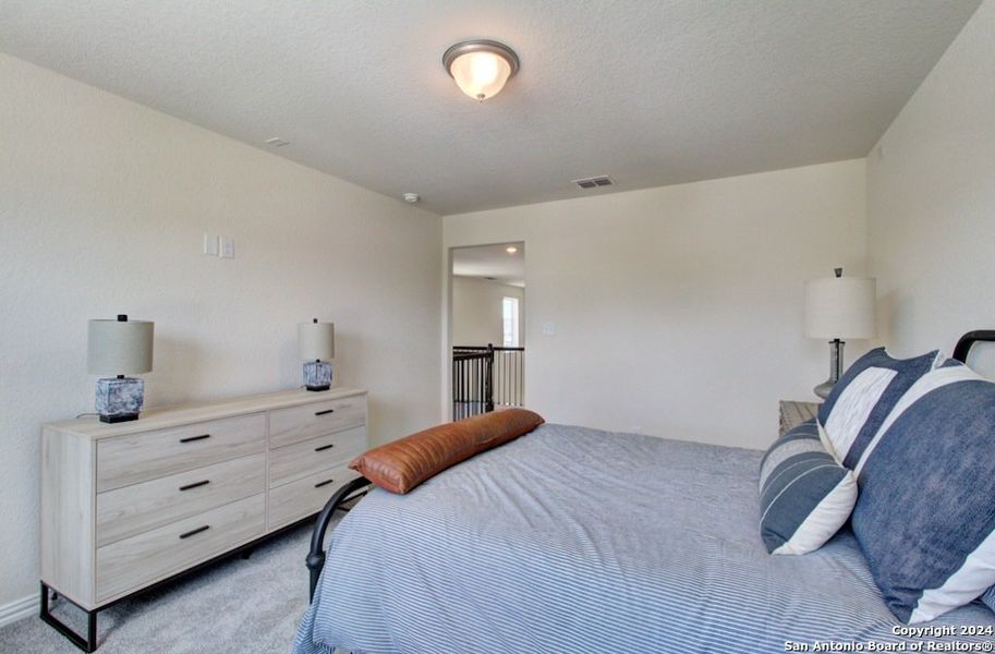 Furnished interior view inside a new home in Casinas at Gruene, New Braunfels (Image 8).