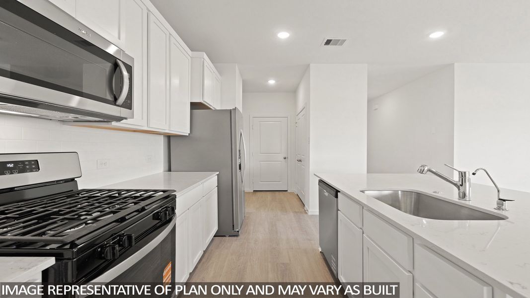 Representative furnished interior of a home built from the Camden by D.R. Horton in Sunterra Lakes, Brookshire (Image 4).