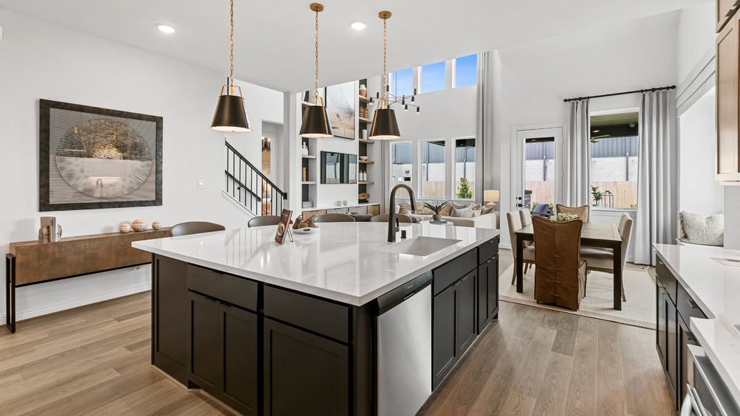 Representative furnished interior of a home built from the Magnolia by Brightland Homes in Sunterra, Katy (Image 5).