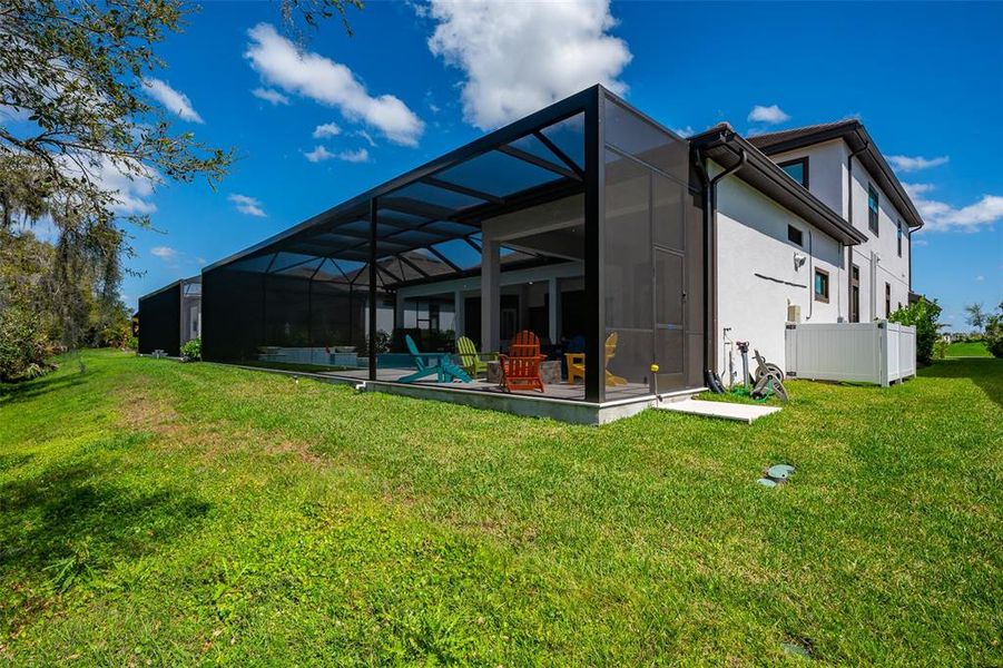 Exterior details and patio area of a home in , Sarasota (Image 37).