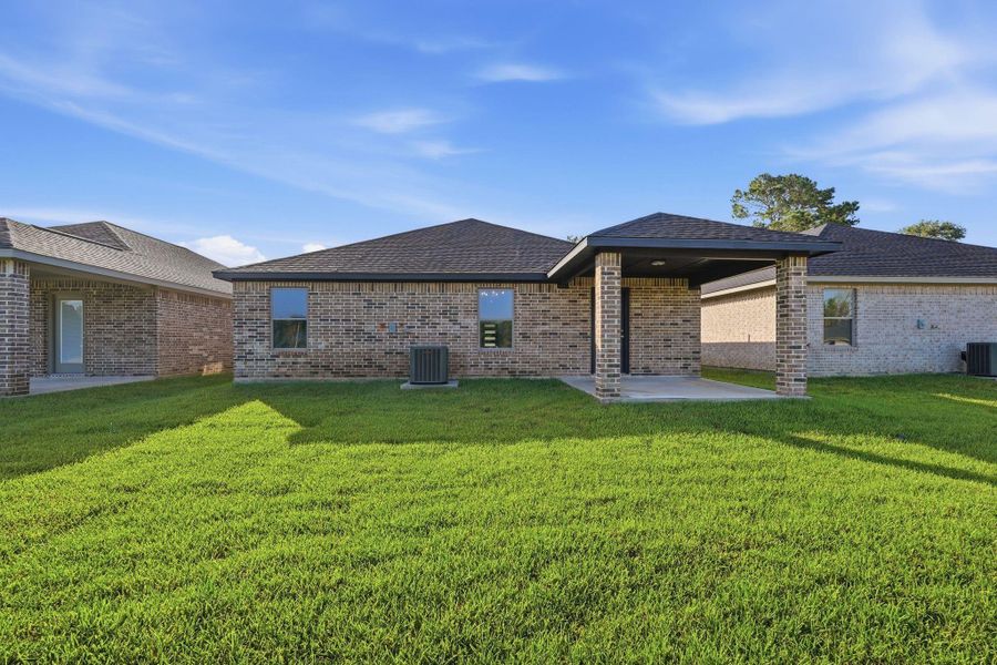 Exterior details and patio area of a home in , Willis (Image 24). Exterior details and patio area of a home in , Willis (Image 24).