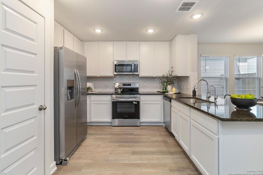 Furnished interior view inside a new home in Katzer Ranch, Converse (Image 15). Furnished interior view inside a new home in Katzer Ranch, Converse (Image 15).