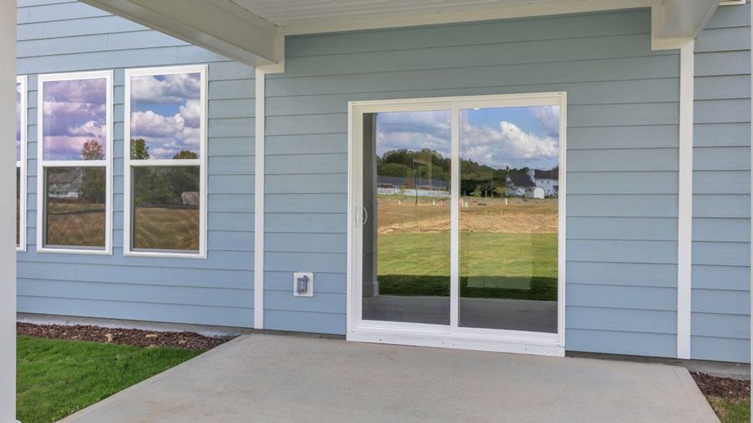 Exterior details and patio area of a home in Eagle Creek, Fuquay Varina (Image 3).