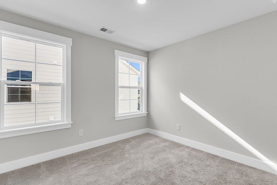 Spacious, unfurnished interior of a new home in Pineland Preserve, Summerville (Image 44).