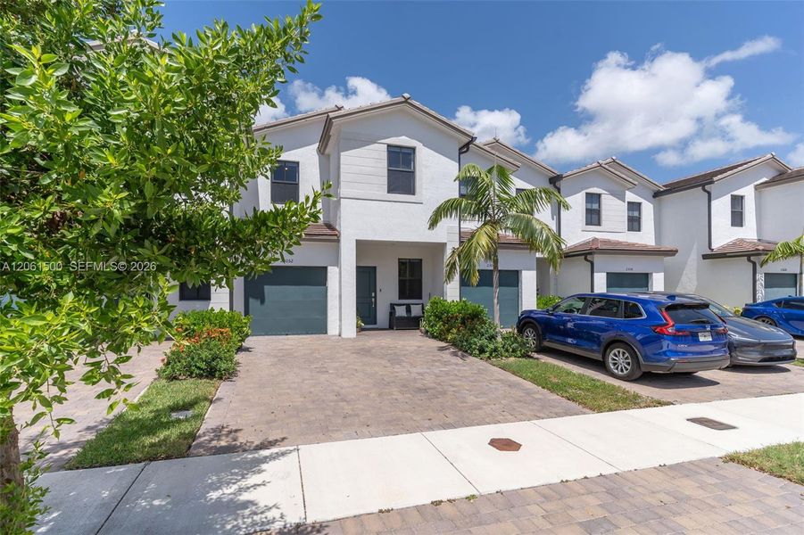 Front exterior of a new home in , Miami, FL, highlighting curb appeal (Image 21). Front exterior of a new home in , Miami, FL, highlighting curb appeal (Image 21).