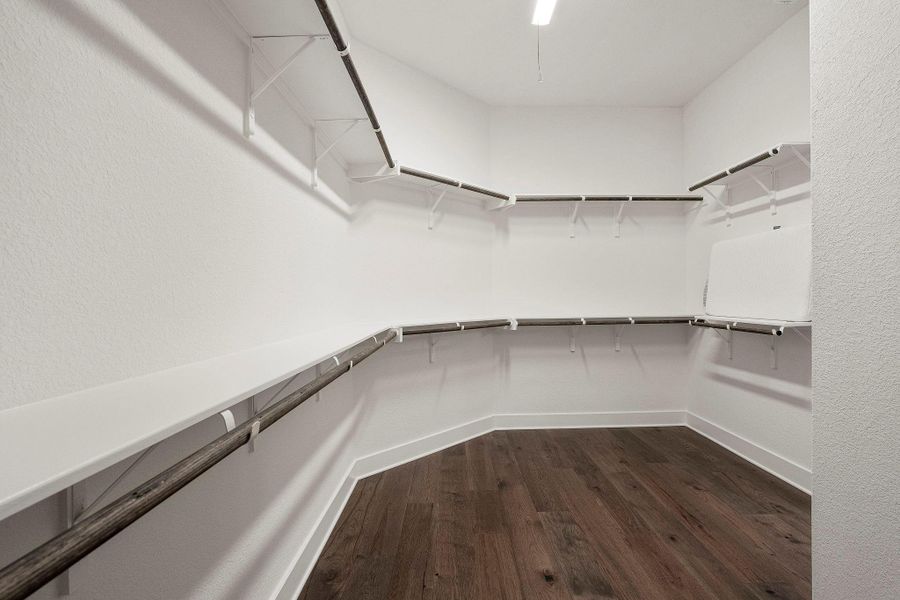 A well-designed walk-in closet offers ample storage and easy organization.