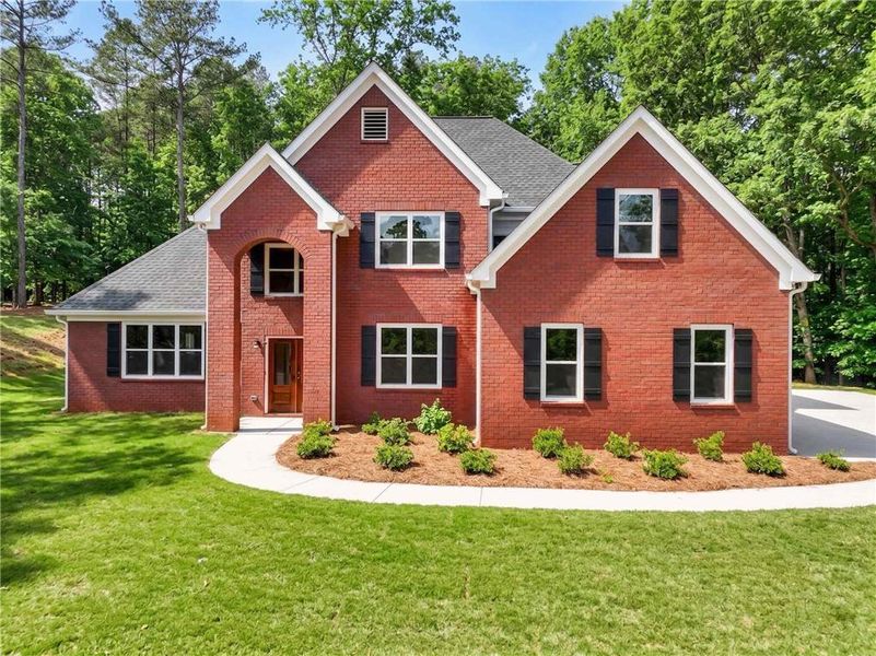 Front exterior of a new home in , Winder, GA, highlighting curb appeal (Image 13).