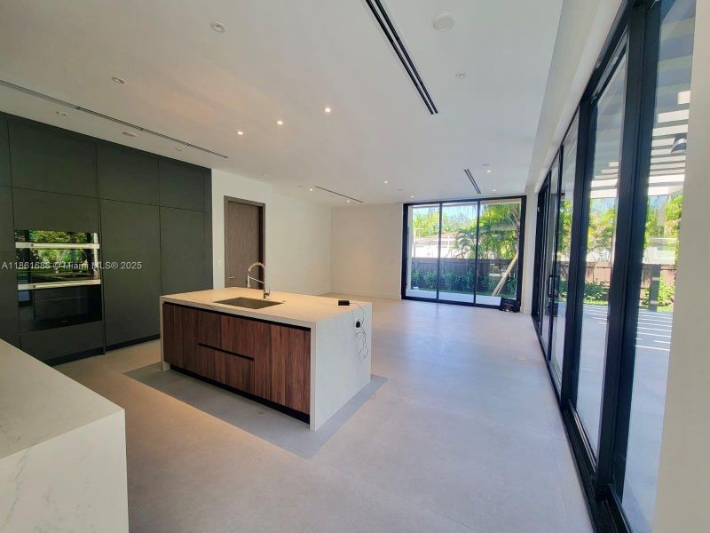 Furnished interior view inside a new home in , South Miami (Image 14). Furnished interior view inside a new home in , South Miami (Image 14).