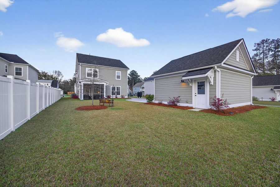 Exterior details and patio area of a home in Pineland Village, Summerville (Image 35).
