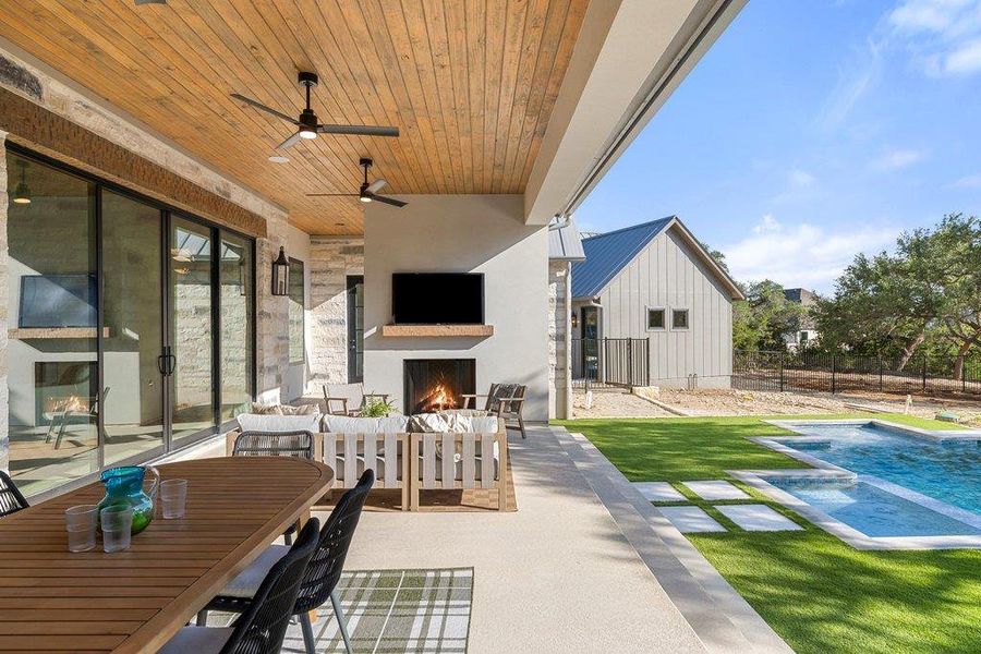 Covered outdoor living with cedar clad ceilings and pool views. Covered outdoor living with cedar clad ceilings and pool views.