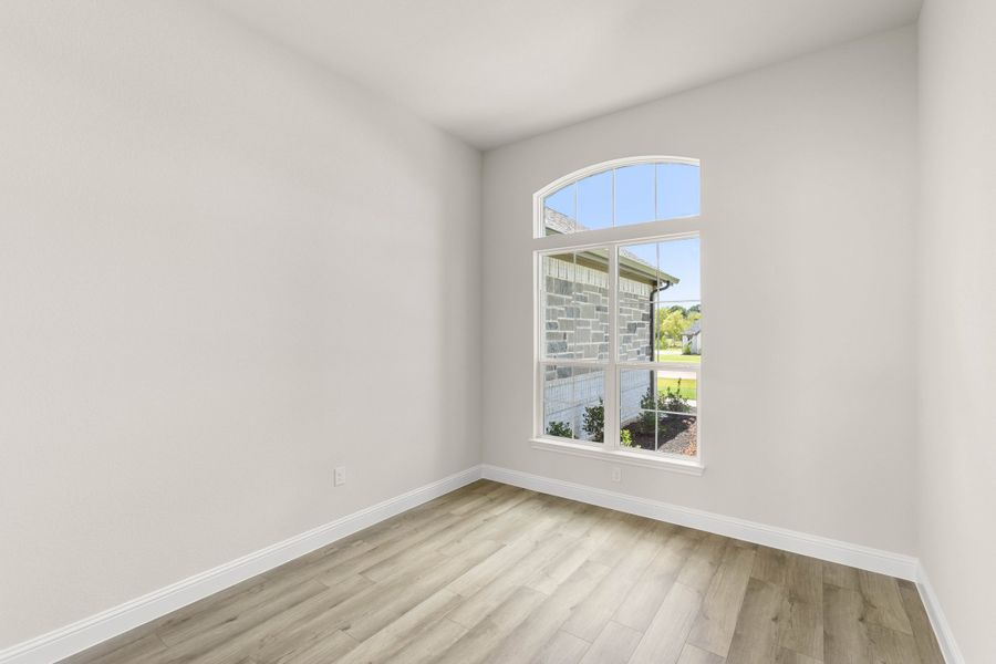 Spacious, unfurnished interior of a new home in Mockingbird Hills - Premiere Series, Joshua (Image 24). Spacious, unfurnished interior of a new home in Mockingbird Hills - Premiere Series, Joshua (Image 24).