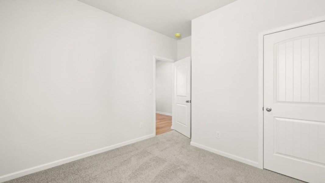 Spacious, unfurnished interior of a new home in South Wind, Fairburn (Image 19).