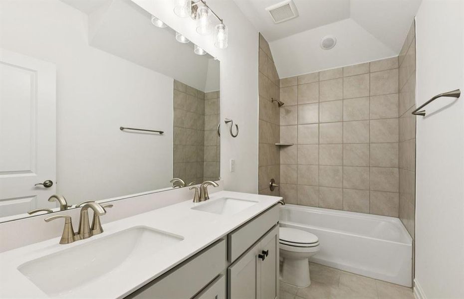 Upgraded secondary bath with elegant finishes *Real home pictured Upgraded secondary bath with elegant finishes *Real home pictured