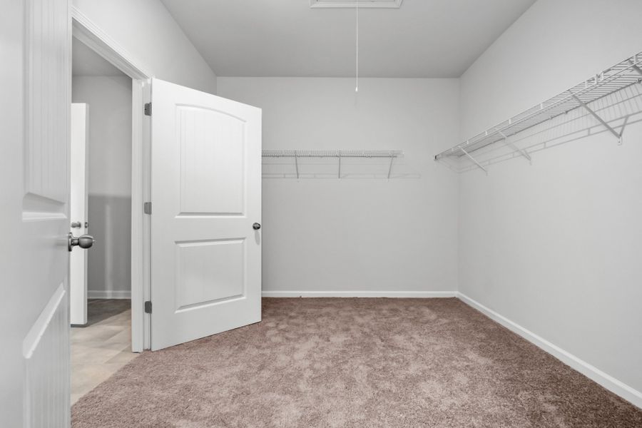 Oversized walk in closet at owner's suite will feature a connection to laundry room.  Some items shown on this picture may vary from the one we are building on lot 79.  Ask agent for details.