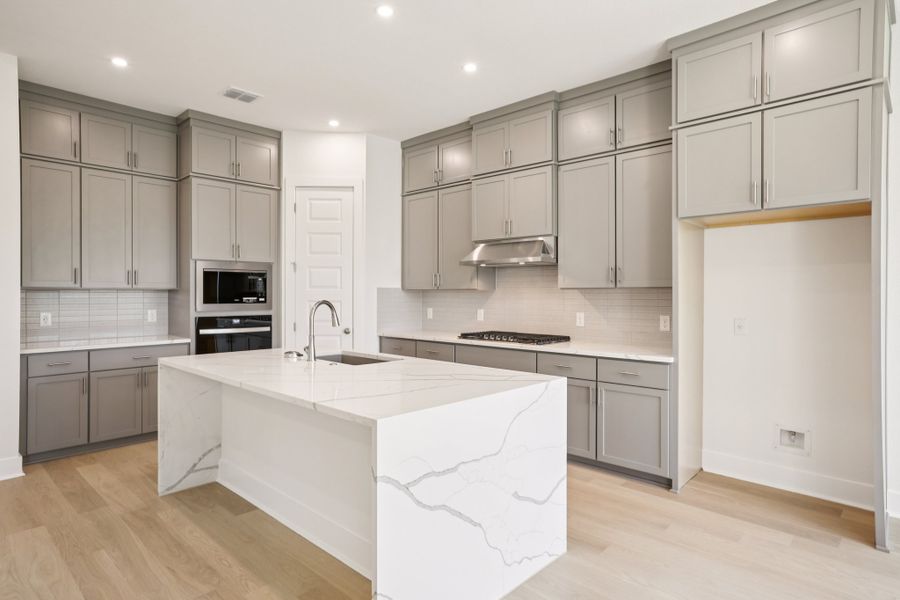 Furnished interior view inside a new home in Persimmon, Buda (Image 4).