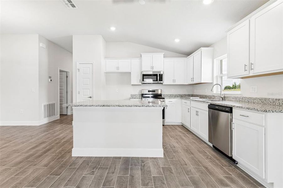 Furnished interior view inside a new home in Abbey Glen, Dade City (Image 13).