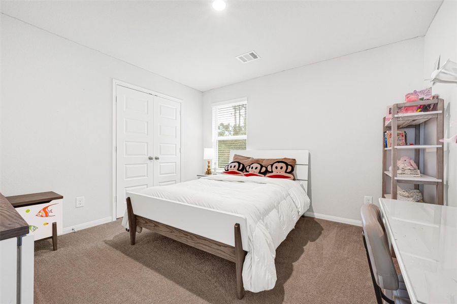 Furnished interior view inside a new home in River's Edge, Conroe (Image 11).
