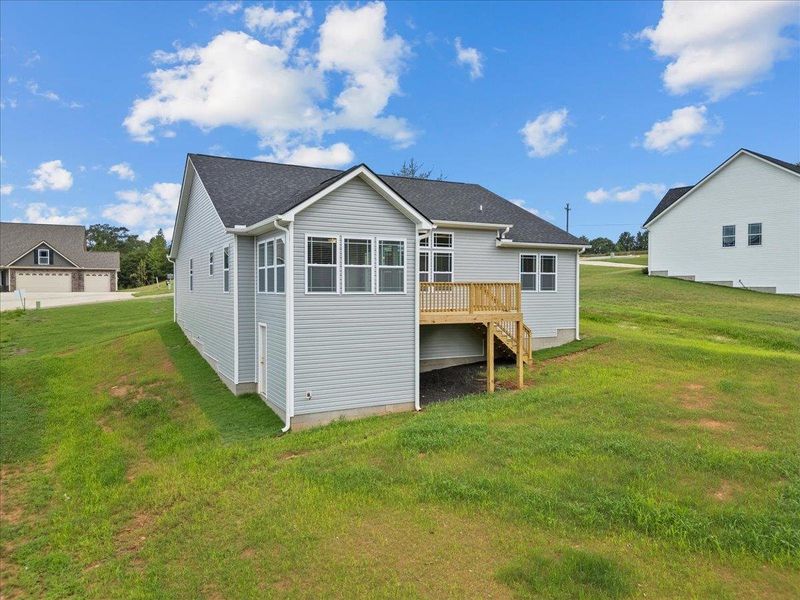 Exterior details and patio area of a home in Fall Creek, Inman (Image 15).
