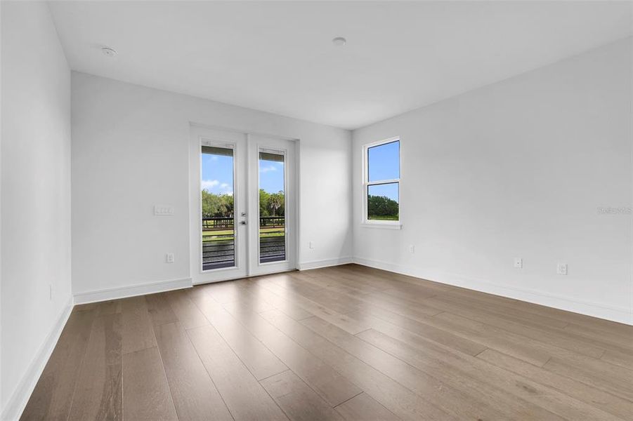 Spacious, unfurnished interior of a new home in Hampton Green at Providence, Davenport (Image 50).