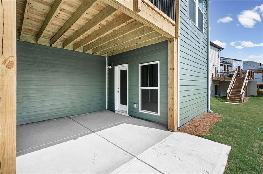 Exterior details and patio area of a home in Twin Lakes, Hoschton (Image 30).