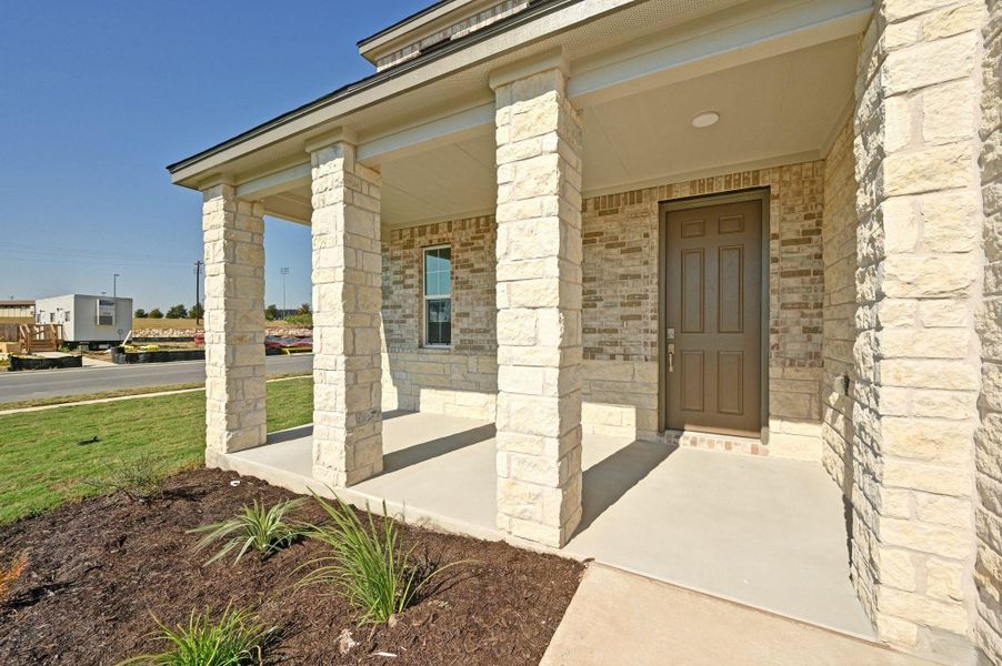 Exterior details and patio area of a home in Mustang Valley, Manor (Image 3). Exterior details and patio area of a home in Mustang Valley, Manor (Image 3).