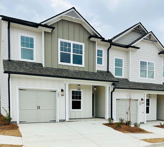 Front exterior of a new home in , Ball Ground, GA, highlighting curb appeal (Image 1). Front exterior of a new home in , Ball Ground, GA, highlighting curb appeal (Image 1).