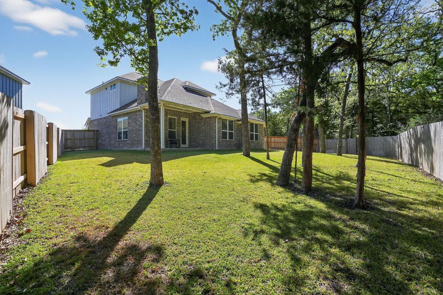 Exterior details and patio area of a home in , College Station (Image 4).