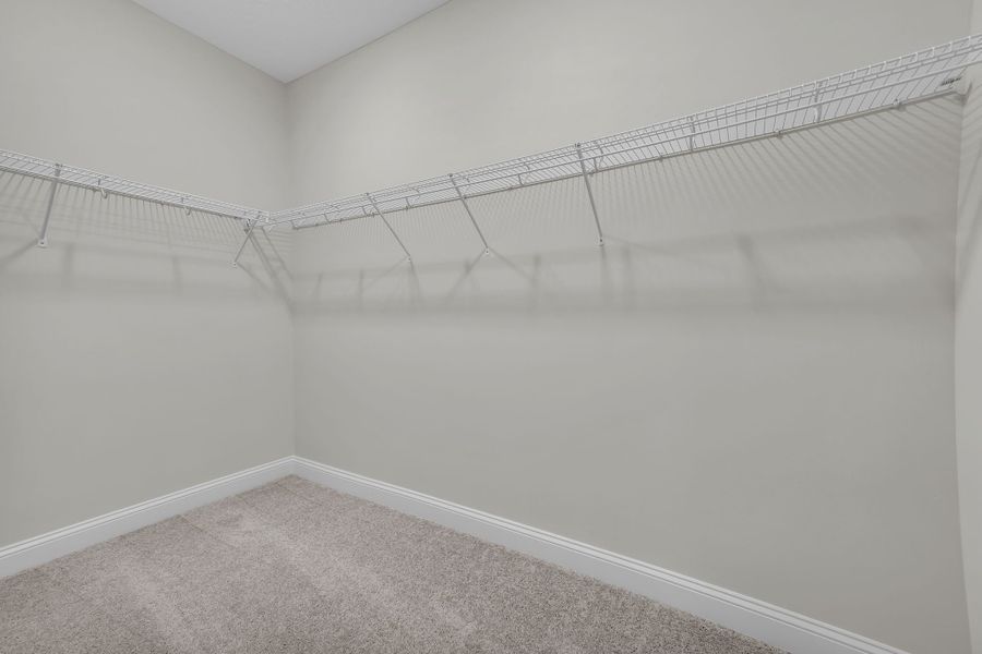 Representative unfurnished interior of a home built from the Avondale by Riverside Homes in Hidden Creek at SilverLeaf 80' Series, St. Augustine (Image 41).