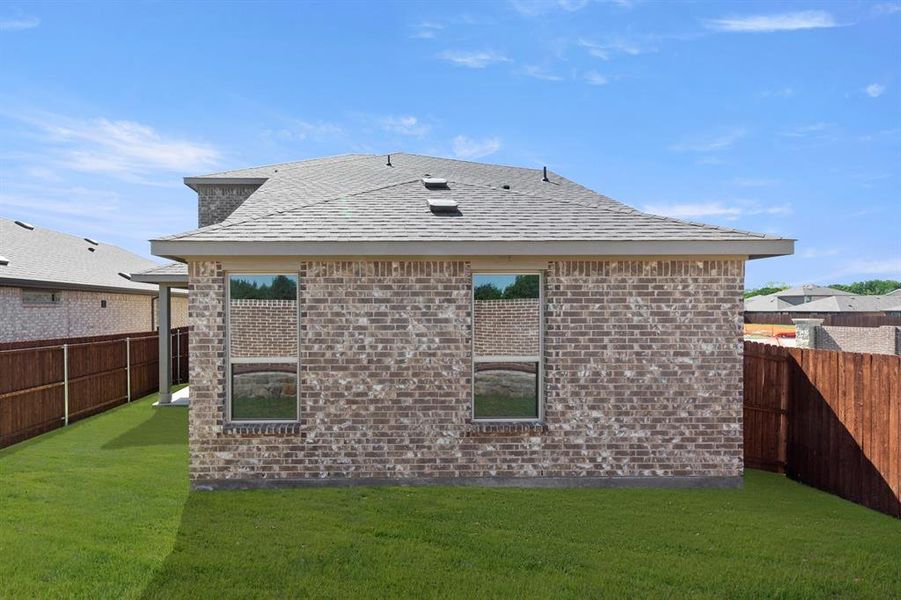 Exterior details and patio area of a home in Bryant Farms, Melissa (Image 21).