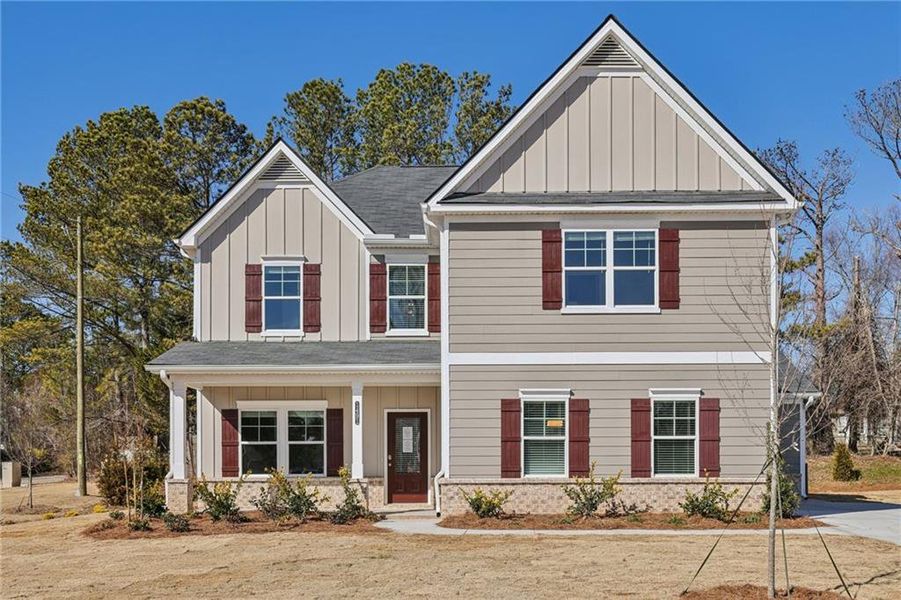 Front exterior of a new home in Stephen's Landing, Loganville, GA, highlighting curb appeal (Image 22).