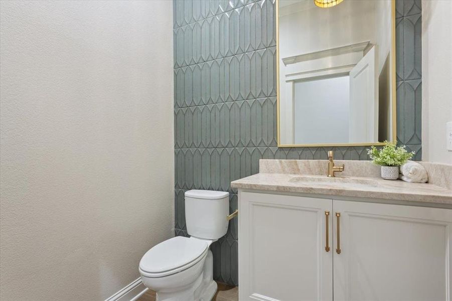 1/2 Bath located in hall to garage entrance 1/2 Bath located in hall to garage entrance