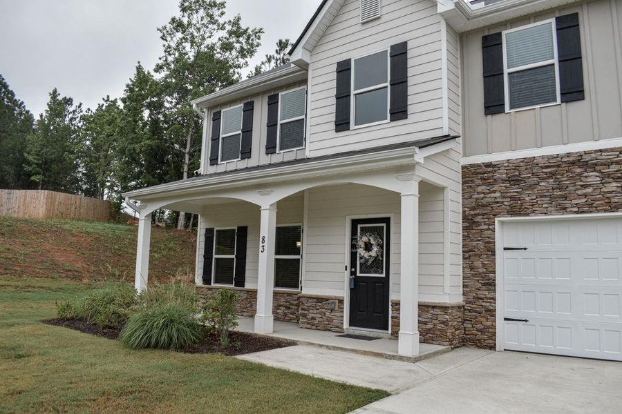 Front exterior of a new home in , Dallas, GA, highlighting curb appeal (Image 2). Front exterior of a new home in , Dallas, GA, highlighting curb appeal (Image 2).