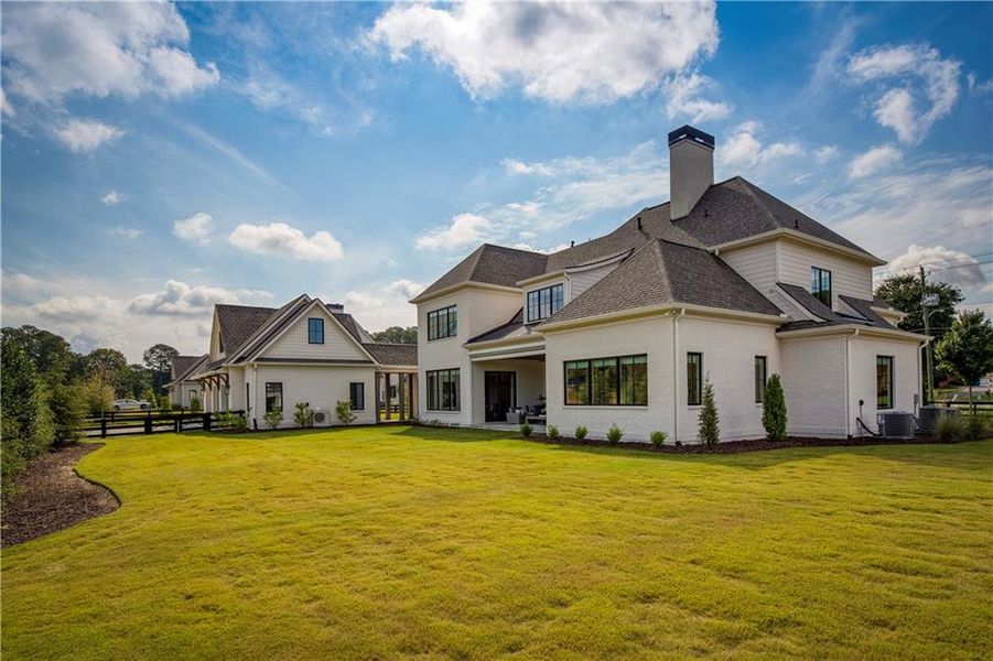 Front exterior of a new home in , Alpharetta, GA, highlighting curb appeal (Image 27). Front exterior of a new home in , Alpharetta, GA, highlighting curb appeal (Image 27).