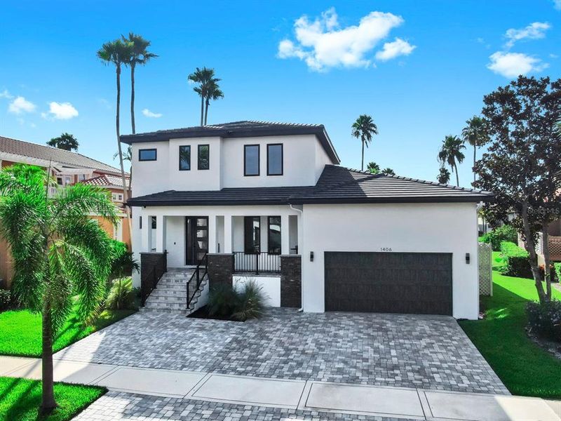 Front exterior of a new home in , Apollo Beach, FL, highlighting curb appeal (Image 19).