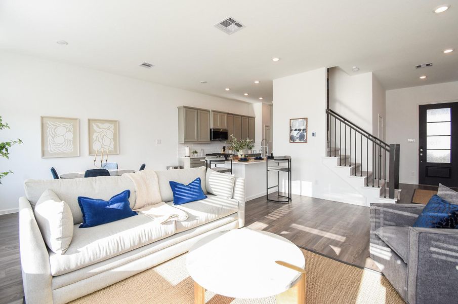 A vibrant and airy living room perfect for gatherings or relaxing evenings.