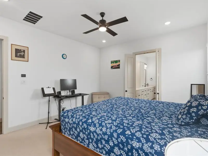 Bedroom with recessed lighting, ceiling fan, and carpeted flooring
