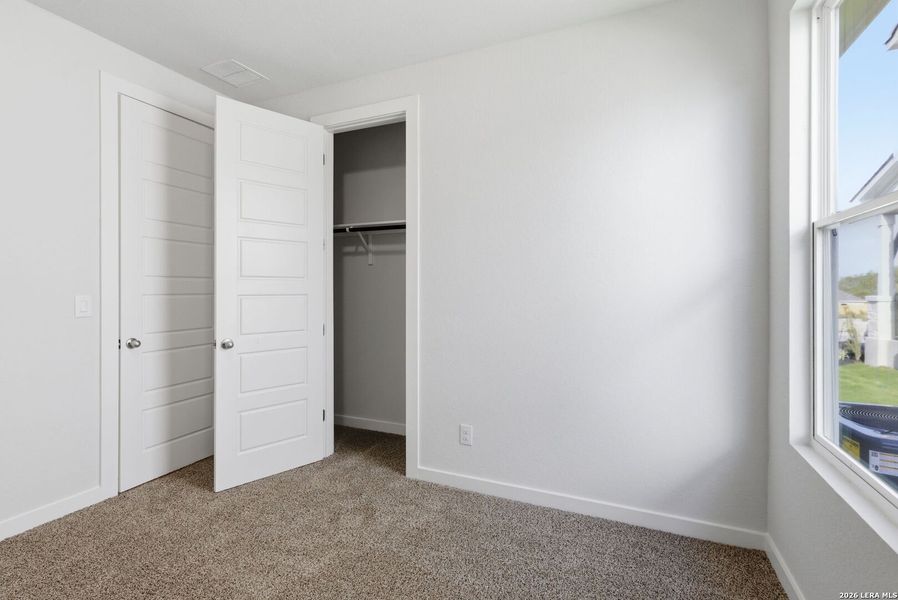 Spacious, unfurnished interior of a new home in The Meadows at Hunters Ranch, San Antonio (Image 33).