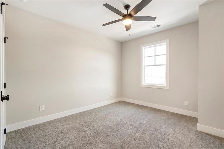 Spacious, unfurnished interior of a new home in Holly Springs Town Center, Holly Springs (Image 28).