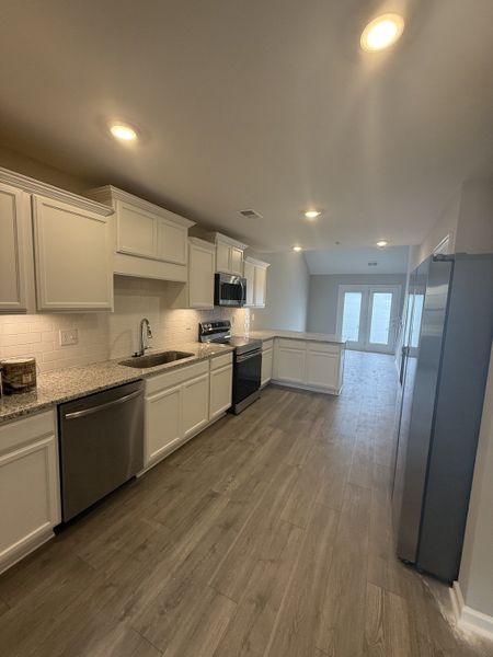 Furnished interior view inside a new home in Legacy Fields, Pleasant View (Image 3).