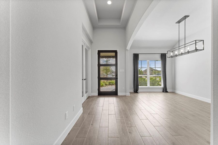 A grand entrance that feels both elegant and inviting. A grand entrance that feels both elegant and inviting.