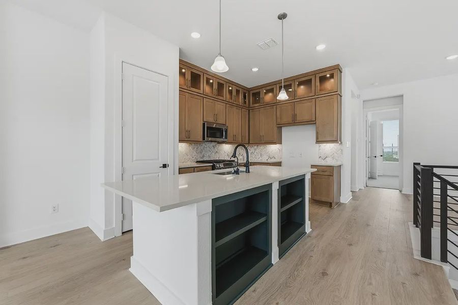 Furnished interior view inside a new home in Centero at Stone Oak, San Antonio (Image 5).