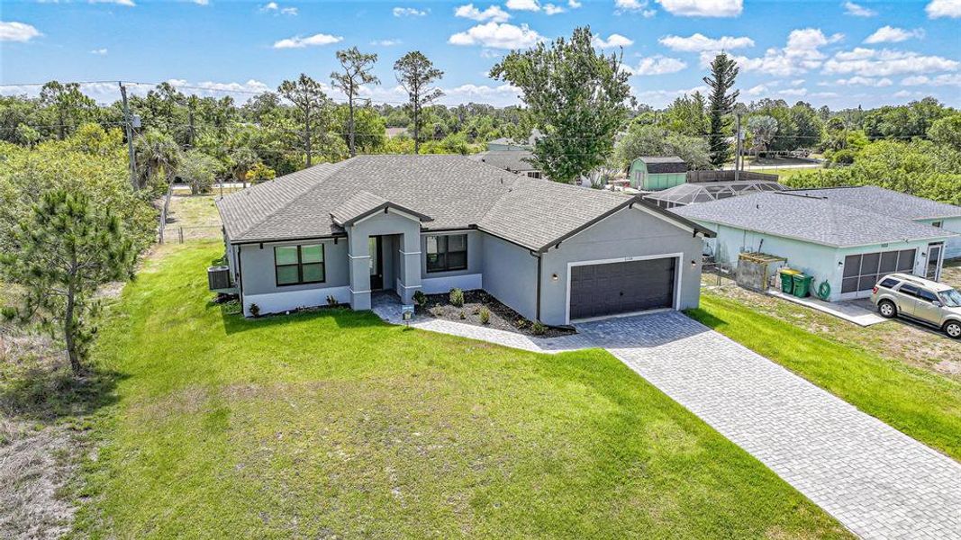 Front exterior of a new home in , Port Charlotte, FL, highlighting curb appeal (Image 31). Front exterior of a new home in , Port Charlotte, FL, highlighting curb appeal (Image 31).