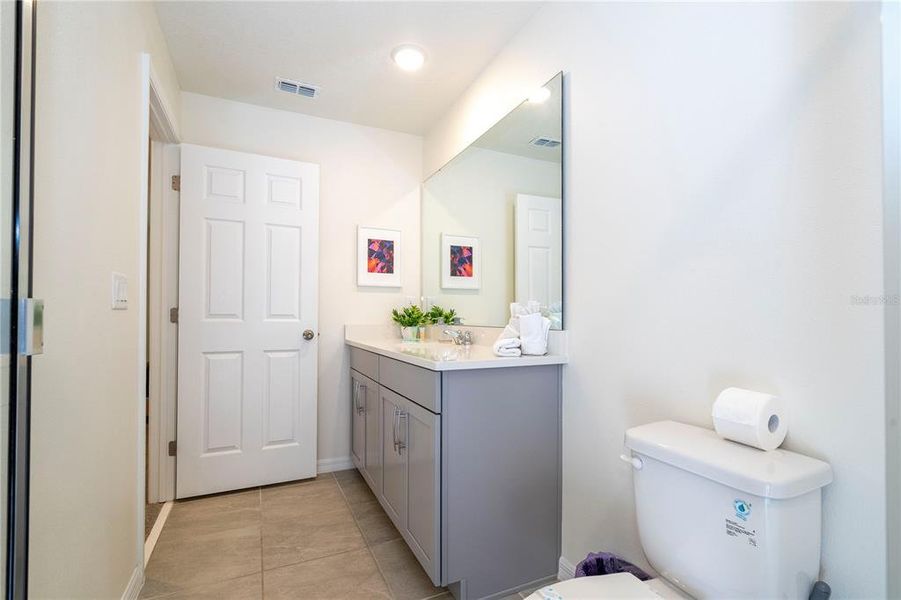 Furnished interior view inside a new home in Solara Resort, Kissimmee (Image 13).
