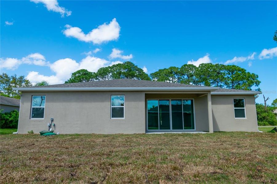Exterior details and patio area of a home in , Palm Bay (Image 4). Exterior details and patio area of a home in , Palm Bay (Image 4).
