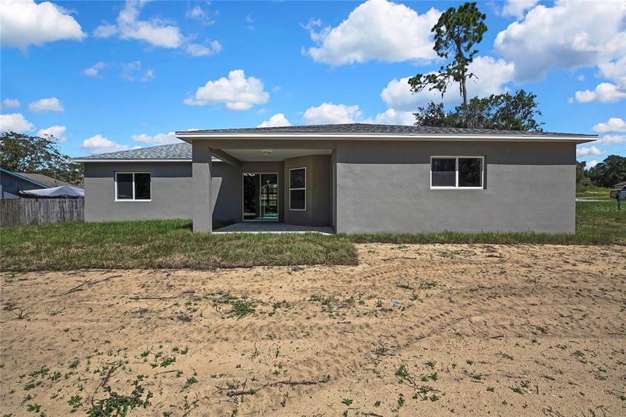 Front exterior of a new home in , Brooksville, FL, highlighting curb appeal (Image 21).