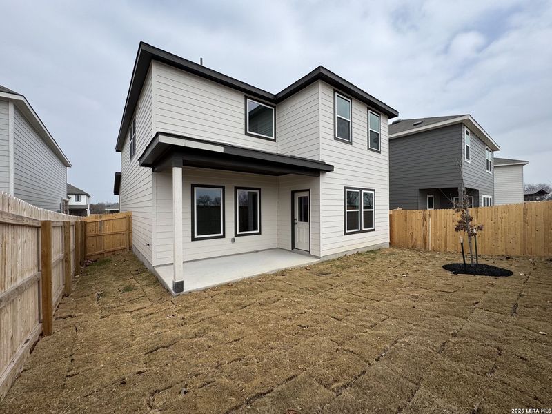 Exterior details and patio area of a home in Hennersby Hollow, San Antonio (Image 3).