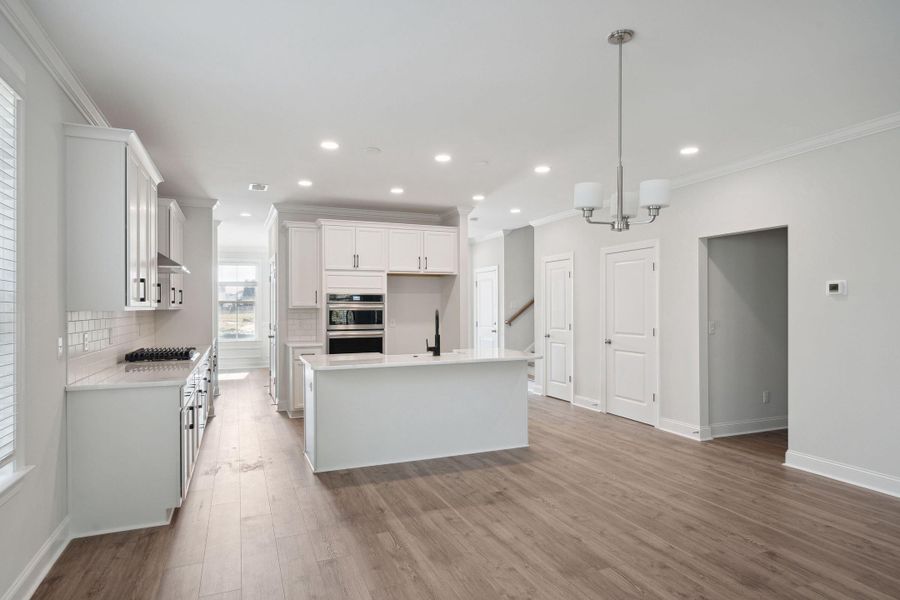 Furnished interior view inside a new home in Tidewater at Lakes of Cane Bay, Summerville (Image 6).